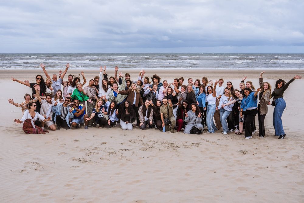 Teamdag Nova op het strand